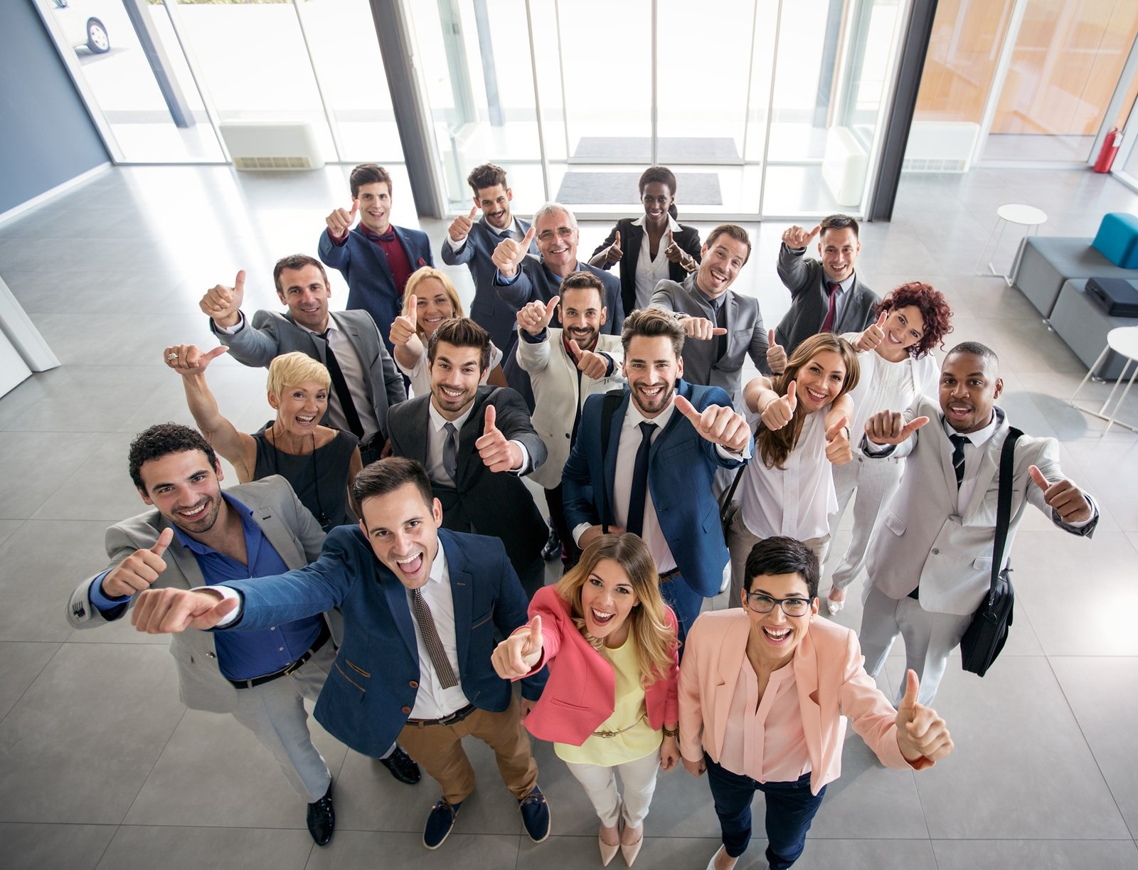 Portrait,Of,Thumb,Up,Smiling,Business,People